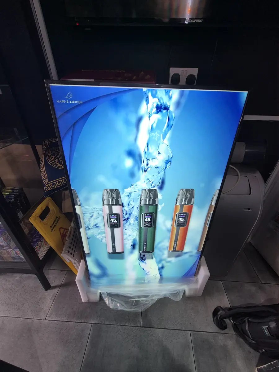 Digital signage at a leisure venue promoting events and memberships.
